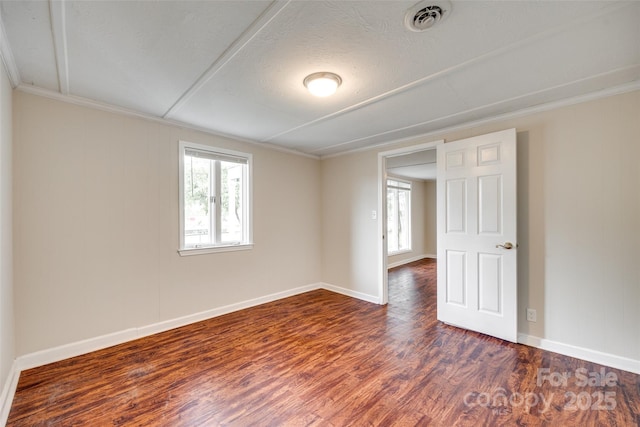 275 N Garrison Rd, Rock Hill, SC 29730 - spare room featuring healthy amount of natural light, dark wood-style flooring, baseboards, crown molding, and a textured ceiling
