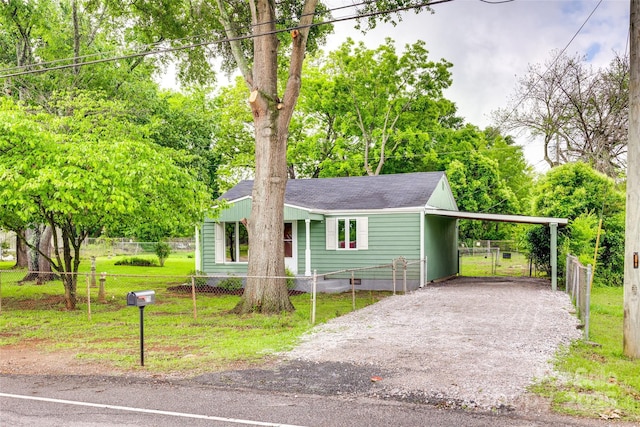 275 N Garrison Rd, Rock Hill, SC 29730 - view of front of property with driveway, a shingled roof, a carport, and view of scattered trees