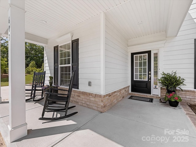 603 Southstone Dr, Matthews, NC 28104 - view of exterior entry with a porch