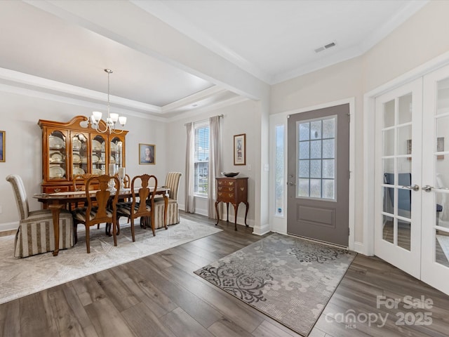 603 Southstone Dr, Matthews, NC 28104 - foyer featuring a chandelier, french doors, wood finished floors, crown molding, and a tray ceiling