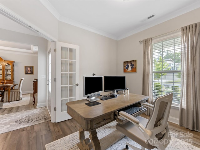 603 Southstone Dr, Matthews, NC 28104 - home office featuring ornamental molding, healthy amount of natural light, light wood finished floors, and baseboards