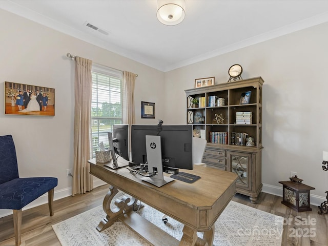 603 Southstone Dr, Matthews, NC 28104 - home office featuring wood finished floors, baseboards, and crown molding