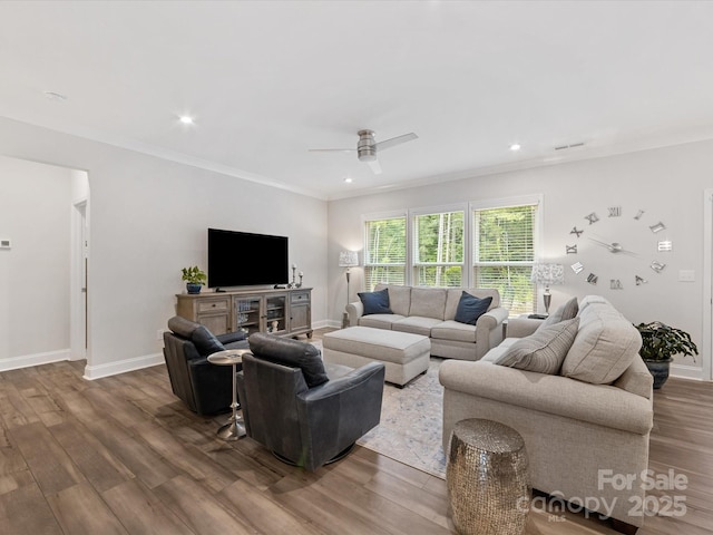 603 Southstone Dr, Matthews, NC 28104 - living area with wood finished floors, a ceiling fan, crown molding, baseboards, and recessed lighting