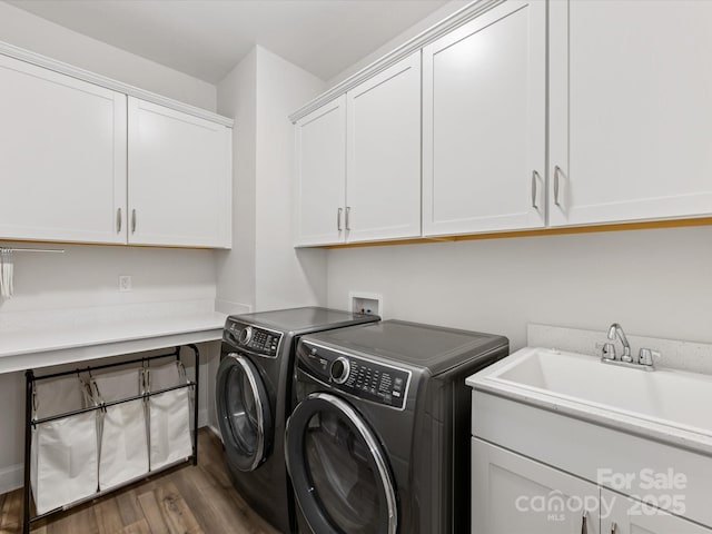 603 Southstone Dr, Matthews, NC 28104 - clothes washing area featuring cabinet space, washing machine and clothes dryer, and wood finished floors