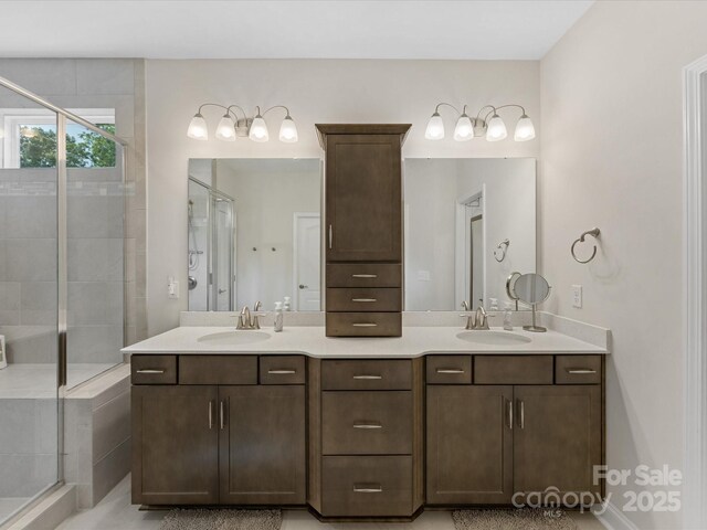 603 Southstone Dr, Matthews, NC 28104 - full bath featuring a stall shower and double vanity