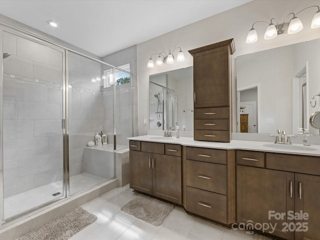 603 Southstone Dr, Matthews, NC 28104 - bathroom featuring a stall shower, tile patterned flooring, and double vanity