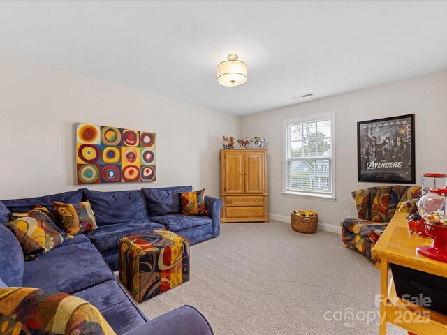 603 Southstone Dr, Matthews, NC 28104 - carpeted living area with baseboards