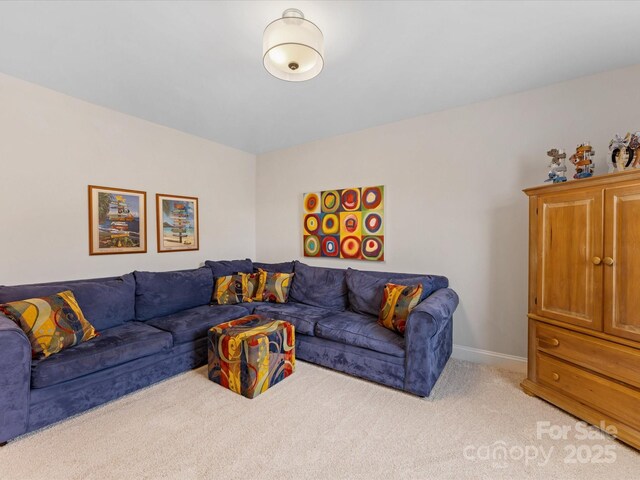 603 Southstone Dr, Matthews, NC 28104 - living room with light carpet and baseboards