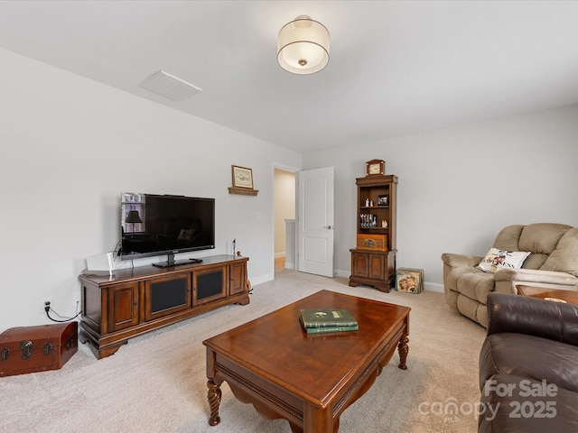 603 Southstone Dr, Matthews, NC 28104 - living area featuring light carpet and baseboards