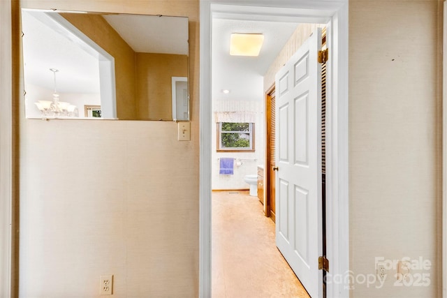 113 Helena St, Mount Holly, NC 28120 - hallway with a chandelier