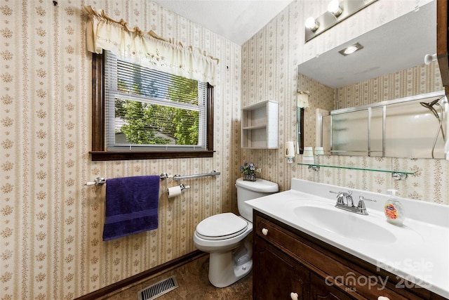 113 Helena St, Mount Holly, NC 28120 - full bathroom with a shower stall, toilet, vanity, and wallpapered walls