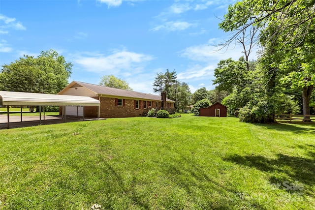 113 Helena St, Mount Holly, NC 28120 - view of green lawn featuring an outdoor structure