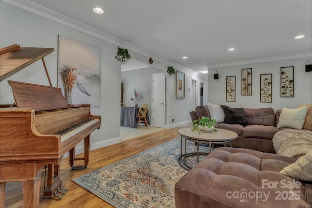 11 Chaz Ln, Candler, NC 28715 - living room with wood finished floors, crown molding, recessed lighting, and baseboards