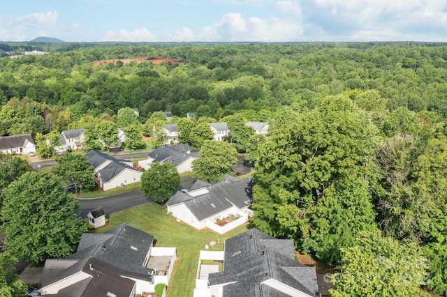 112 Dujon Ct, Mount Holly, NC 28120 - aerial view of property's location featuring a heavily wooded area and nearby suburban area
