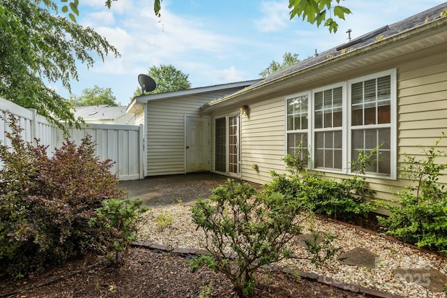 112 Dujon Ct, Mount Holly, NC 28120 - rear view of property with fence and a patio area