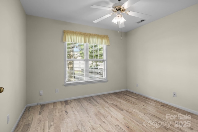 112 Dujon Ct, Mount Holly, NC 28120 - spare room featuring wood finished floors, ceiling fan, and baseboards
