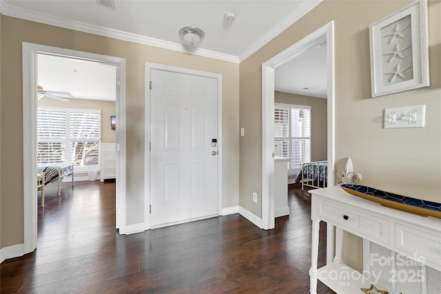 18631 Harborside Dr, Cornelius, NC 28031 - foyer featuring plenty of natural light, dark wood-type flooring, crown molding, baseboards, and a ceiling fan