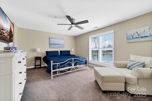 18631 Harborside Dr, Cornelius, NC 28031 - carpeted bedroom featuring baseboards and ceiling fan