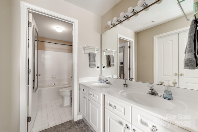 18631 Harborside Dr, Cornelius, NC 28031 - full bath with double vanity, toilet, tile patterned floors, bathtub / shower combination, and baseboards