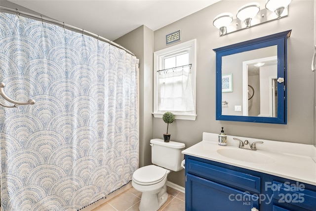 full bath featuring vanity, toilet, tile patterned floors, and baseboards