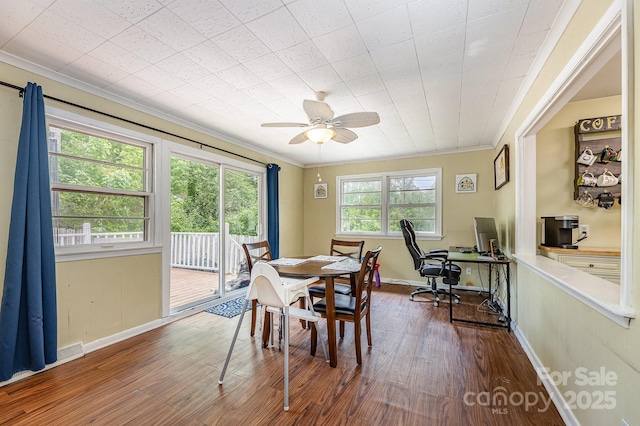 3104 Canterbury St, Greensboro, NC 27408 - dining area with ornamental molding, dark wood-type flooring, a ceiling fan, baseboards, and an office area
