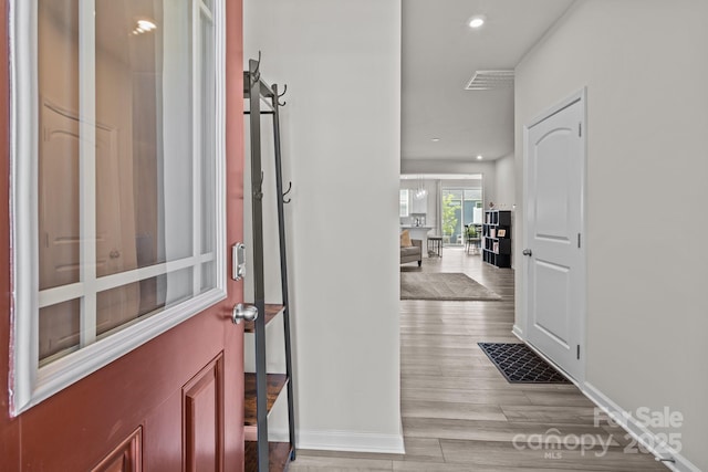5625 Axil Ln, Charlotte, NC 28269 - entryway featuring light wood-style floors, recessed lighting, and baseboards