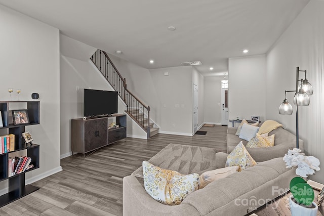 5625 Axil Ln, Charlotte, NC 28269 - living room with stairway, wood finished floors, recessed lighting, and baseboards