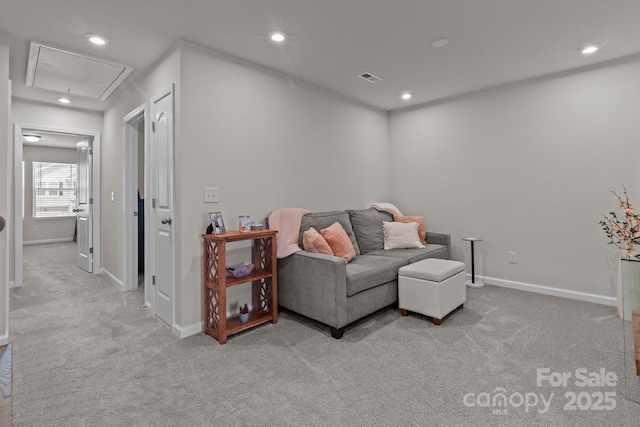 5625 Axil Ln, Charlotte, NC 28269 - living room with attic access, light carpet, baseboards, and recessed lighting