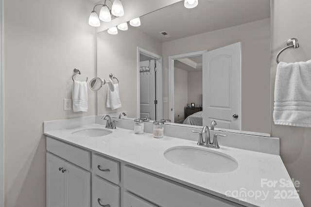 5625 Axil Ln, Charlotte, NC 28269 - bathroom with double vanity and connected bathroom