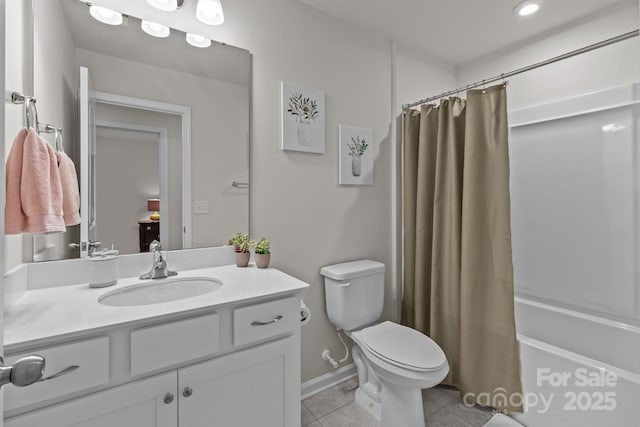 5625 Axil Ln, Charlotte, NC 28269 - bathroom with vanity, tile patterned flooring, shower / bath combination with curtain, toilet, and baseboards