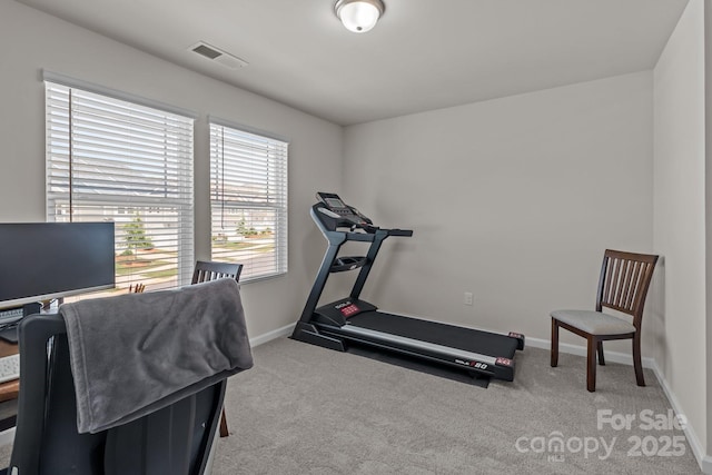 5625 Axil Ln, Charlotte, NC 28269 - exercise area featuring baseboards and carpet flooring
