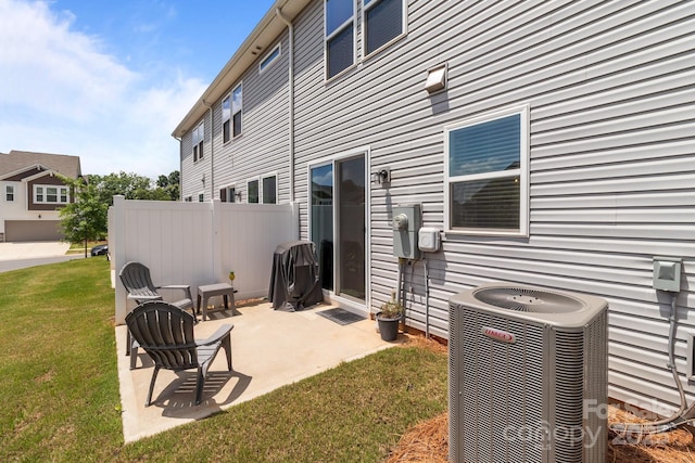 5625 Axil Ln, Charlotte, NC 28269 - back of property with cooling unit and a patio