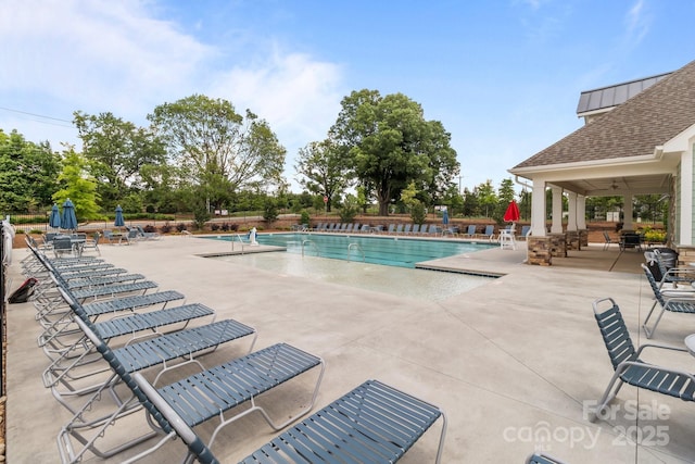 5625 Axil Ln, Charlotte, NC 28269 - community pool featuring a patio area