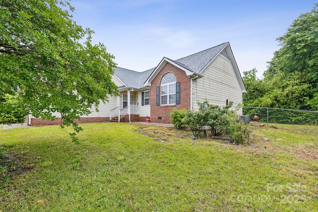 113 Stacy Ln, Raeford Township, NC 28376 - view of front of property with central AC, roof with shingles, crawl space, and brick siding