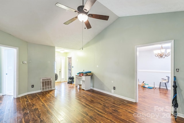 113 Stacy Ln, Raeford Township, NC 28376 - unfurnished living room with ceiling fan, wood finished floors, lofted ceiling, a chandelier, and baseboards