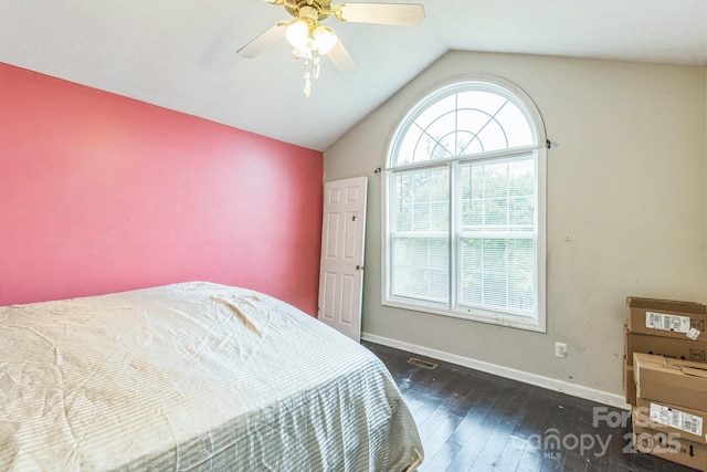 113 Stacy Ln, Raeford Township, NC 28376 - bedroom with wood-type flooring, lofted ceiling, baseboards, and ceiling fan