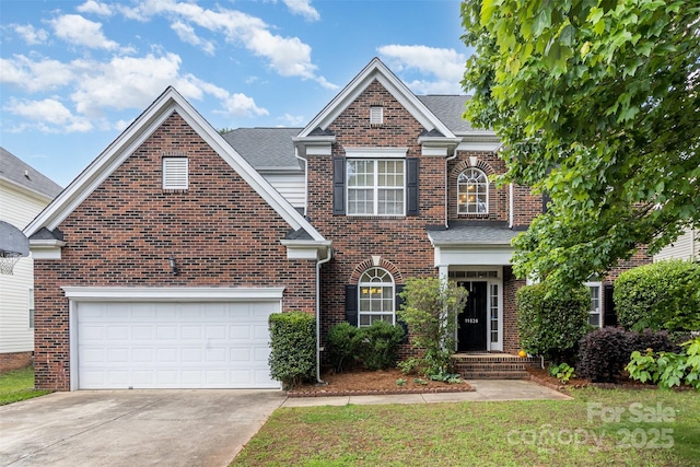 11526 Mcginns Trace Ct, Charlotte, NC 28277 - view of front of house with brick siding, driveway, roof with shingles, a garage, and a front yard