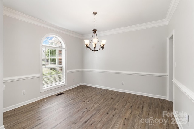 11526 Mcginns Trace Ct, Charlotte, NC 28277 - spare room featuring a chandelier, wood finished floors, crown molding, and baseboards