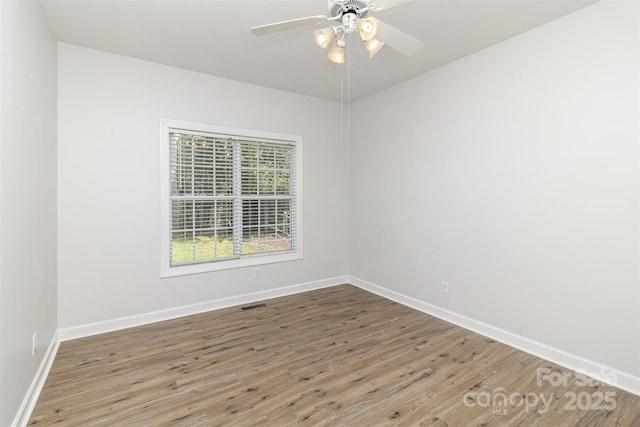 11526 Mcginns Trace Ct, Charlotte, NC 28277 - empty room featuring wood finished floors, baseboards, and a ceiling fan