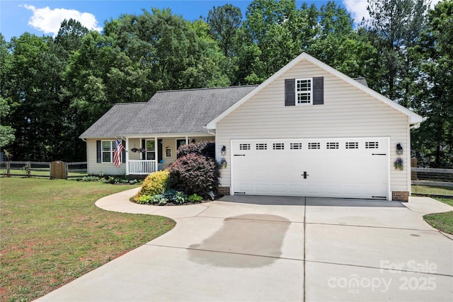 5764 Grassy Creek Rd, Denver, NC 28037 - view of front facade with concrete driveway, a porch, and an attached garage