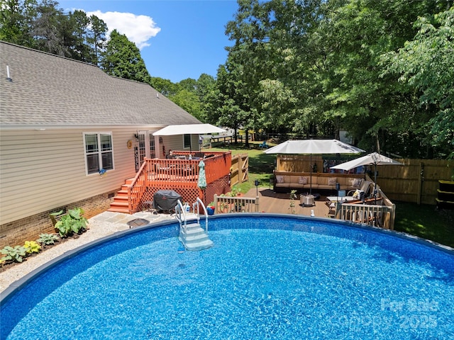5764 Grassy Creek Rd, Denver, NC 28037 - view of swimming pool with a deck, outdoor lounge area, fence, and view of scattered trees