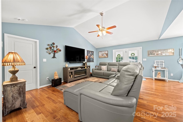 5764 Grassy Creek Rd, Denver, NC 28037 - living area with ceiling fan, vaulted ceiling, light wood-style floors, and baseboards