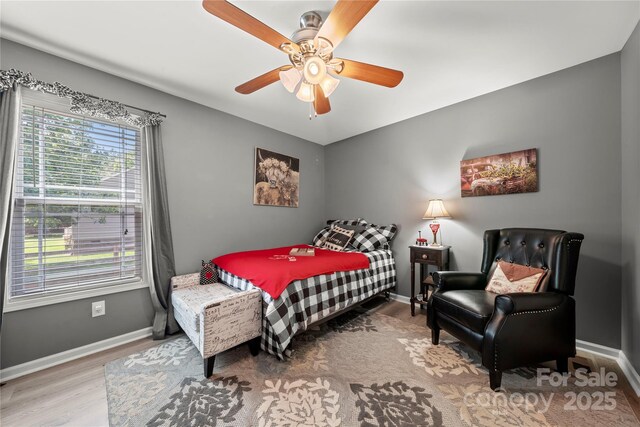 5764 Grassy Creek Rd, Denver, NC 28037 - bedroom featuring wood finished floors, baseboards, and ceiling fan
