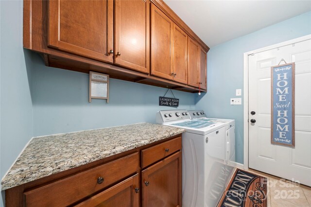 5764 Grassy Creek Rd, Denver, NC 28037 - clothes washing area with cabinet space, separate washer and dryer, and light tile patterned flooring