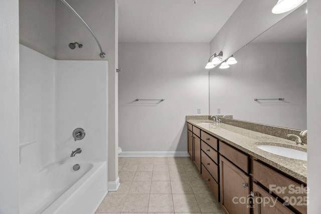 120F Steinbeck Way, Mooresville, NC 28117 - bathroom featuring double vanity, tub / shower combination, tile patterned floors, and baseboards