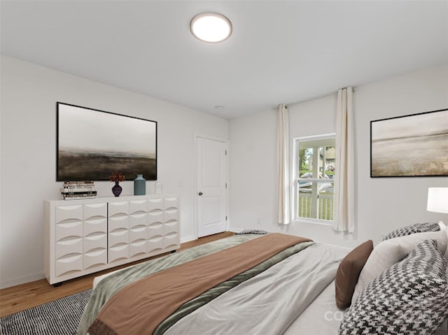 60 Valley St NW, Concord, NC 28025 - bedroom featuring wood finished floors and baseboards