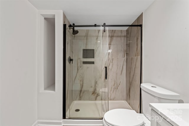 60 Valley St NW, Concord, NC 28025 - full bath featuring toilet, a marble finish shower, and vanity