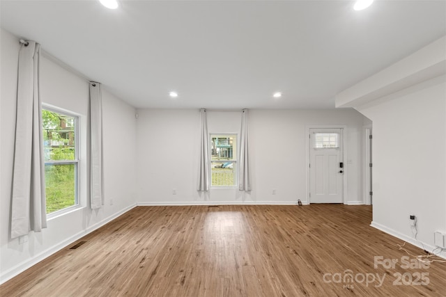 60 Valley St NW, Concord, NC 28025 - spare room with recessed lighting, light wood-type flooring, and baseboards