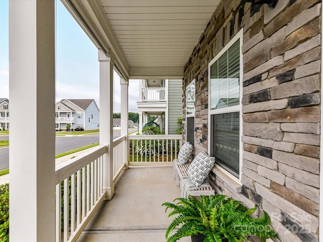 134 Kerri Dawn Ln Unit 117, Locust, NC 28097 - covered porch with a residential view