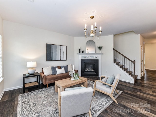 134 Kerri Dawn Ln Unit 117, Locust, NC 28097 - living room featuring stairs, wood finished floors, a chandelier, and baseboards